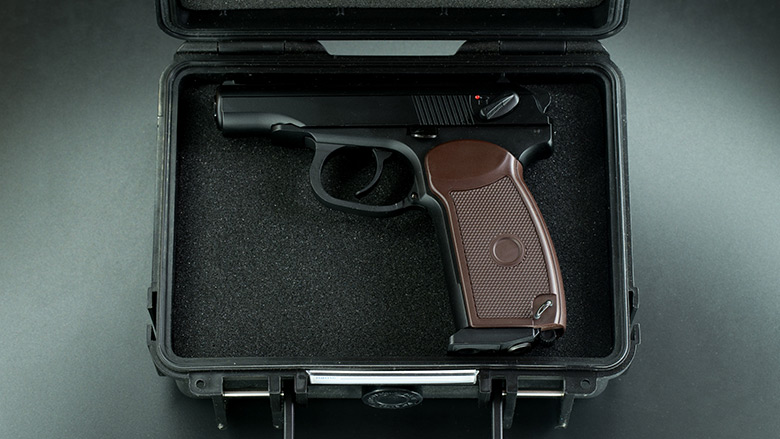Opened Strong Box Reveals a Firearm
